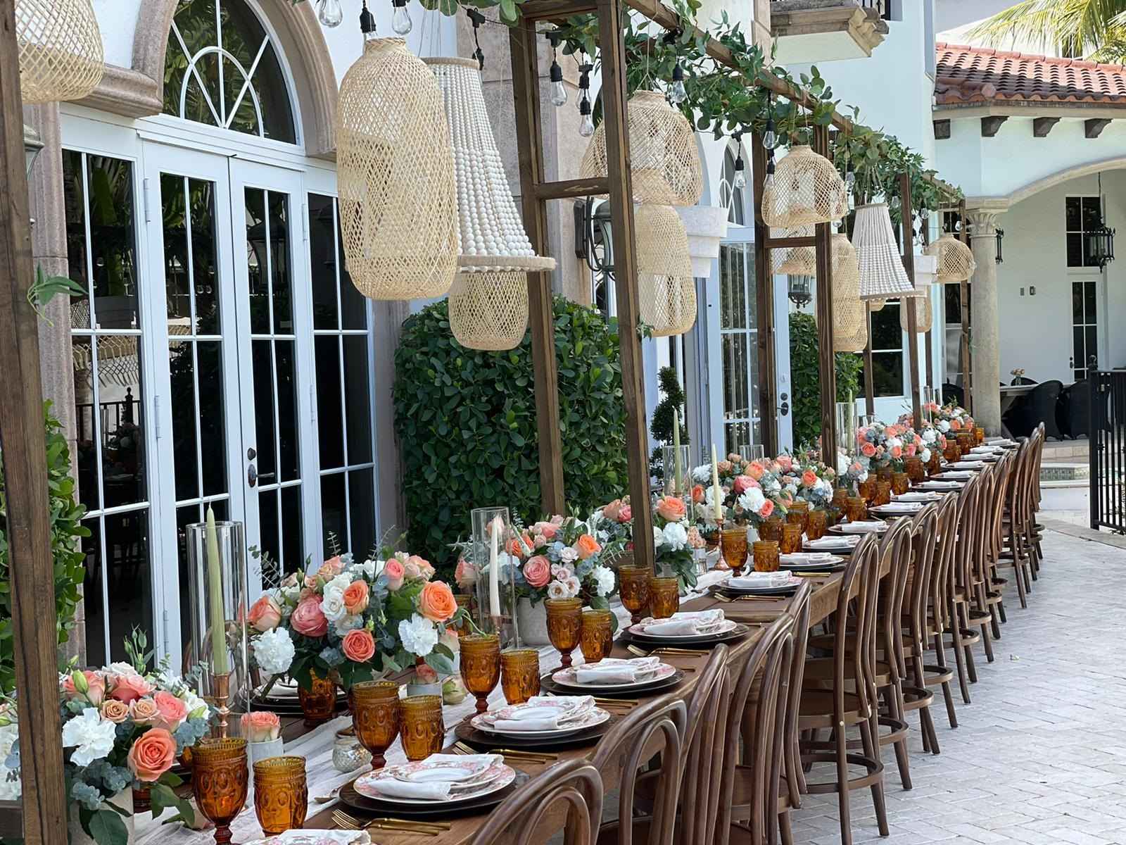 Long reception table in a courtyard