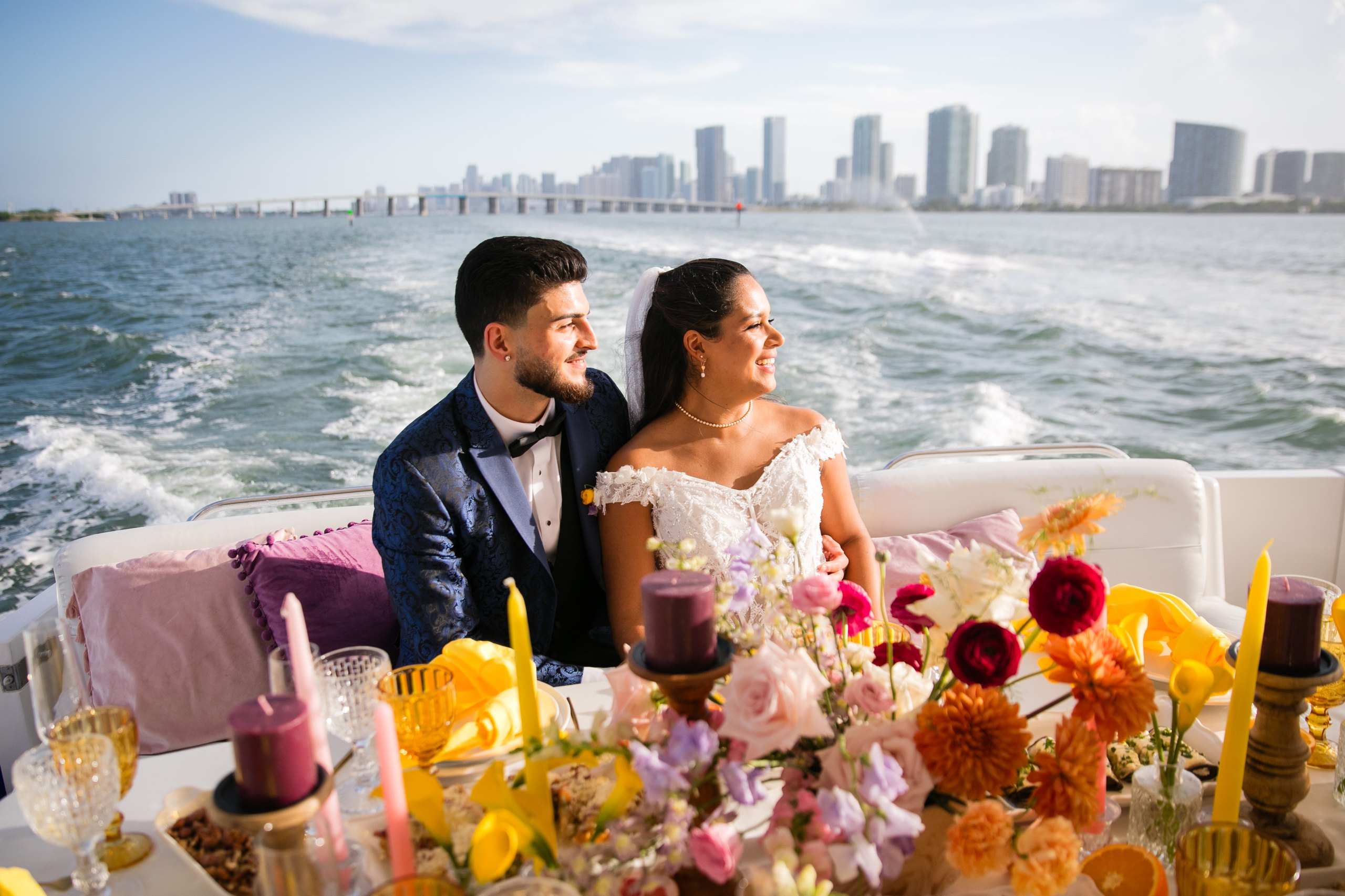 Couple on a yacht with the Miami skyline